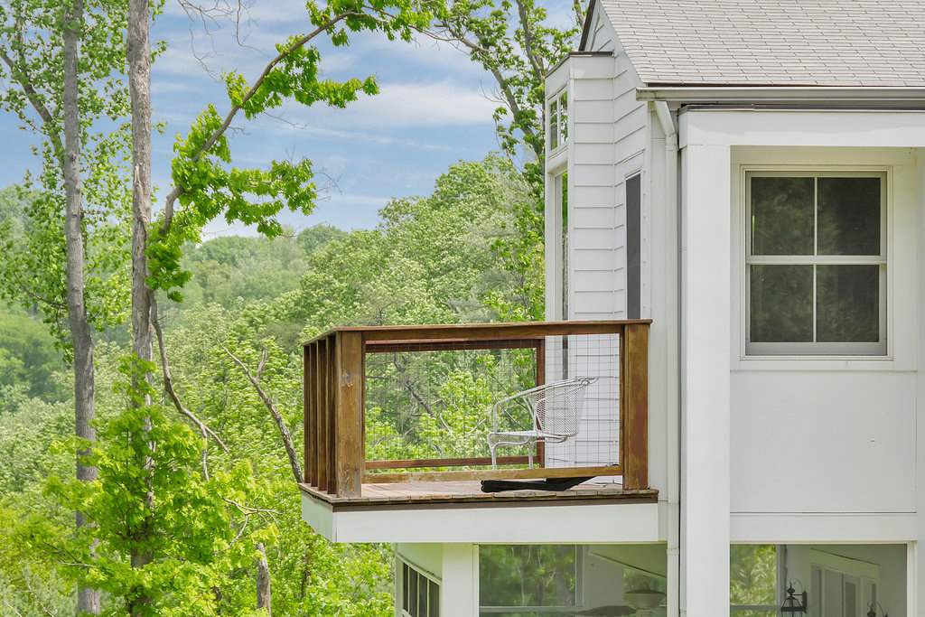 3354 Free Union Road Charlottesville, VA 22901 - Photo 31 of 45 a view of a house with a large windows and plants