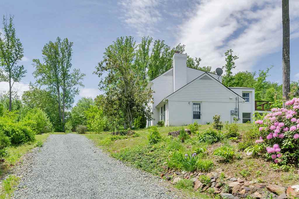3354 Free Union Road Charlottesville, VA 22901 - Photo 43 of 45 a view of a house with a yard and potted plants