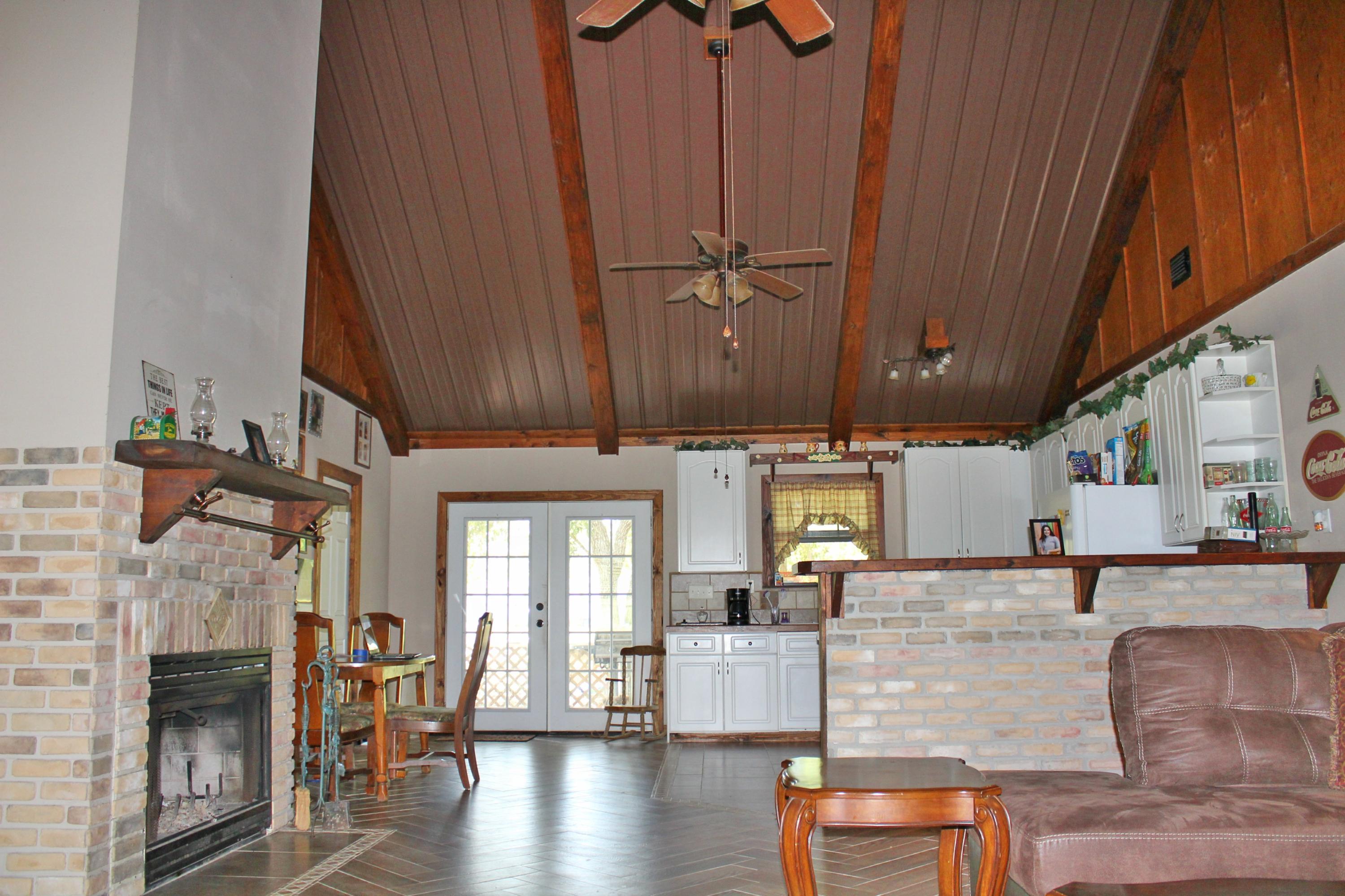 2913 King Lake Road DeFuniak Springs, FL 32433 - Photo 7 of 31 an entryway with fireplace and furniture