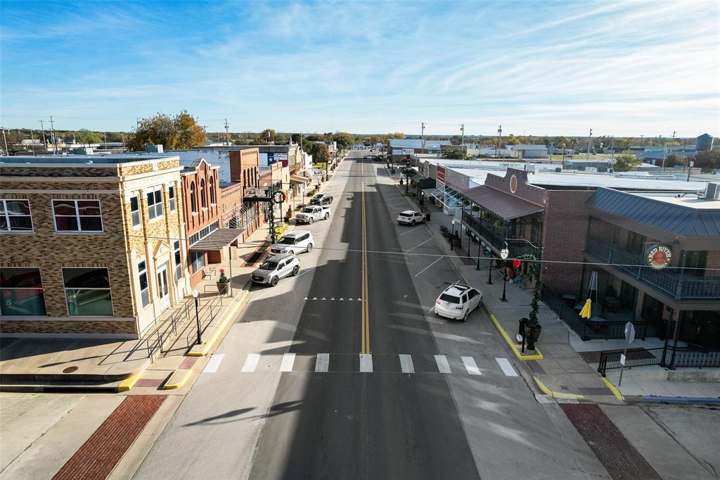 207 West Walnut Street Nocona, TX 76255 - Photo 18 of 22 a view of a terrace with city view