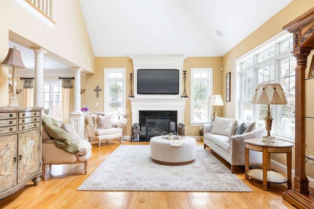 192 Boston Post Road, Unit 8 Sudbury, MA 01776 - Photo 1 of 27 a living room with furniture and a fireplace