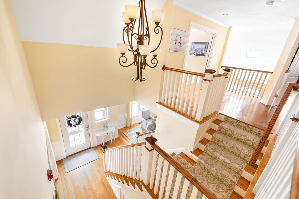 192 Boston Post Road, Unit 8 Sudbury, MA 01776 - Photo 12 of 27 a view of a staircase with white walls