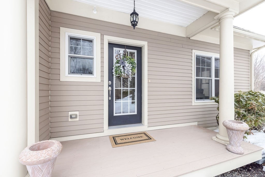 192 Boston Post Road, Unit 8 Sudbury, MA 01776 - Photo 26 of 27 a view of a entryway door front of house