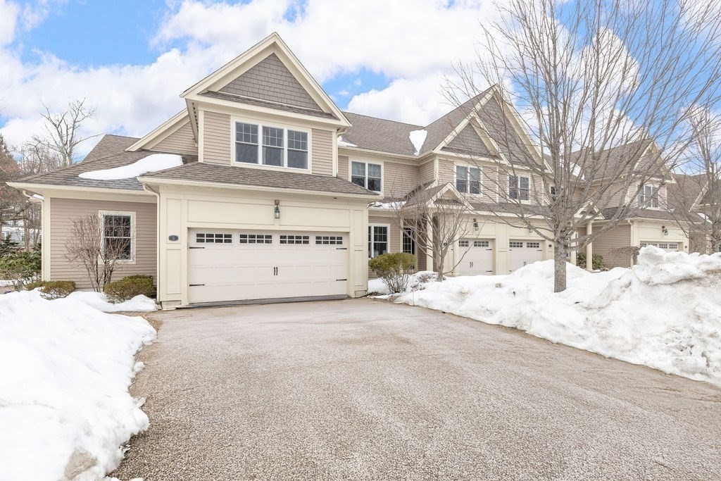 192 Boston Post Road, Unit 8 Sudbury, MA 01776 - Photo 27 of 27 a view of white house with a large tree in front of it
