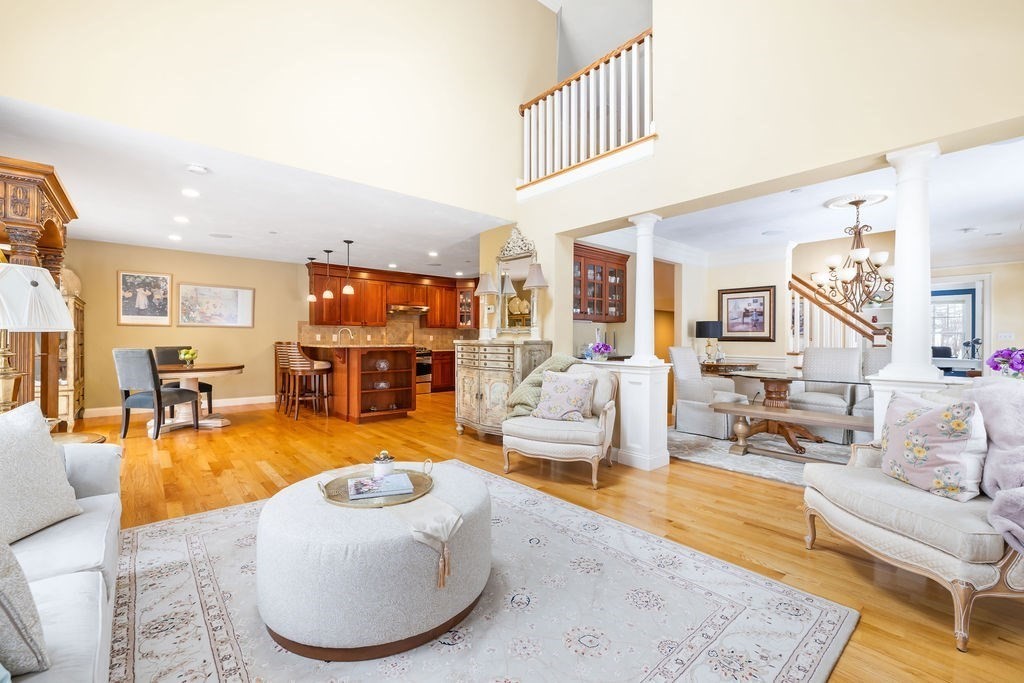 192 Boston Post Road, Unit 8 Sudbury, MA 01776 - Photo 3 of 27 a living room with furniture and a large window