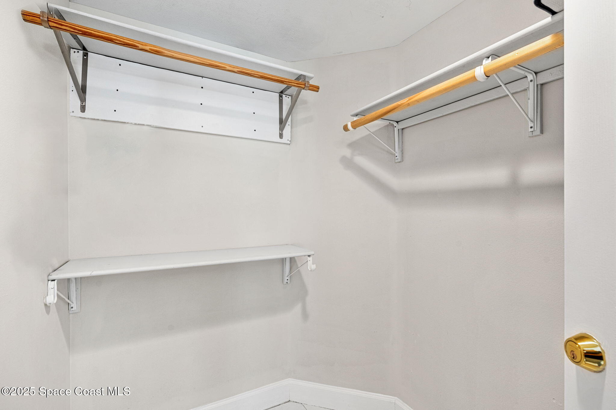 1155 South Atlantic Avenue, Unit 203 Cocoa Beach, FL 32931 - Photo 31 of 41 a bathroom with a shower and a sink