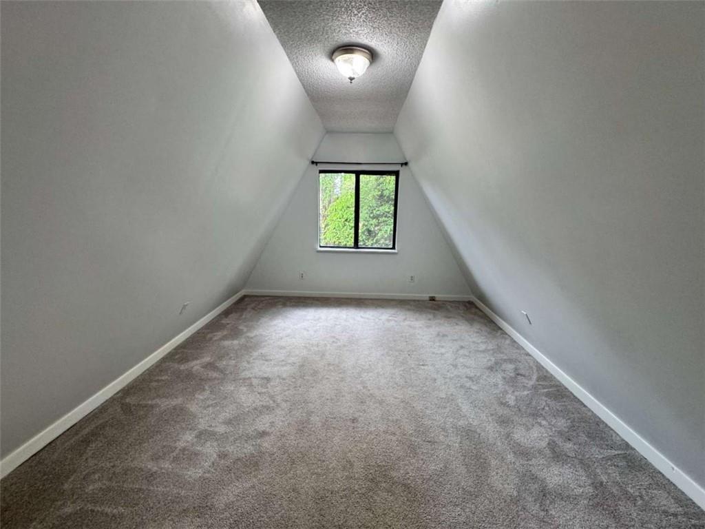 2475 Hawk Creek Trail Cumming, GA 30041 - Photo 18 of 24 an empty room that has a window
