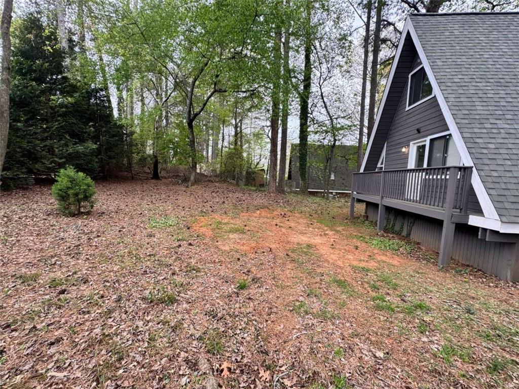 2475 Hawk Creek Trail Cumming, GA 30041 - Photo 24 of 24 a view of a house with a yard