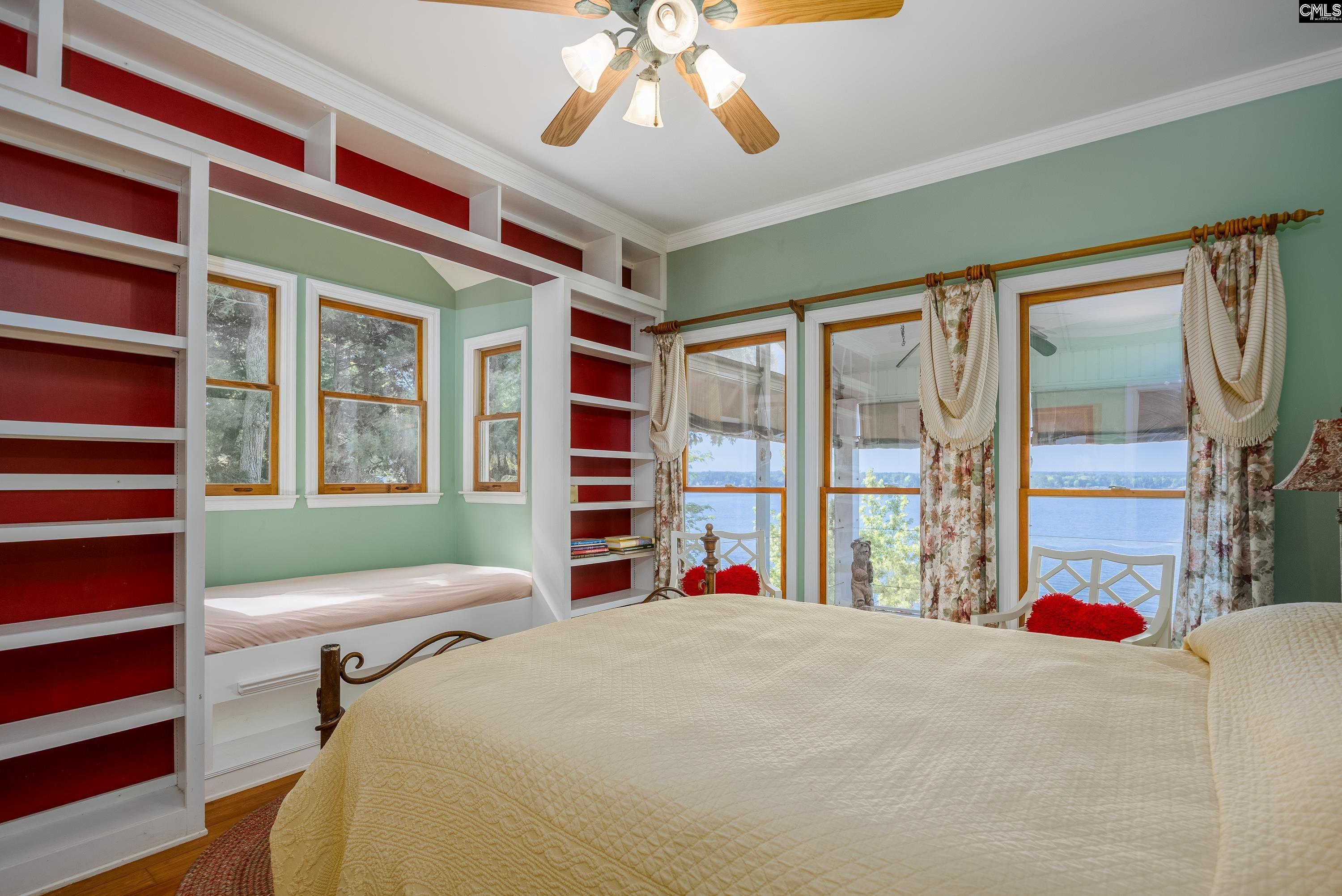2577 Harbor View Road Camden, SC 29020 - Photo 30 of 42 a bedroom with a bed and a large window