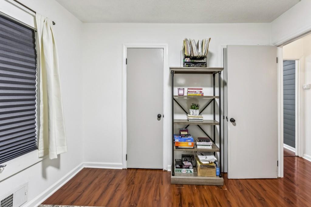 5430 Carol Circle Southwest Mableton, GA 30126 - Photo 22 of 32 a room that has a bed and a window in it