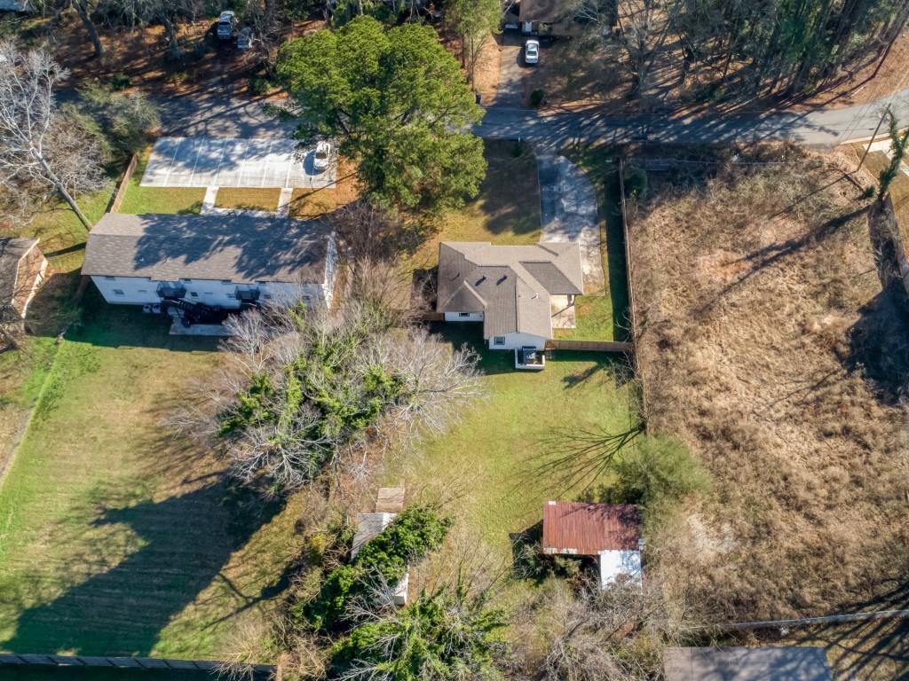 5430 Carol Circle Southwest Mableton, GA 30126 - Photo 29 of 32 a swimming pool with some trees in the background