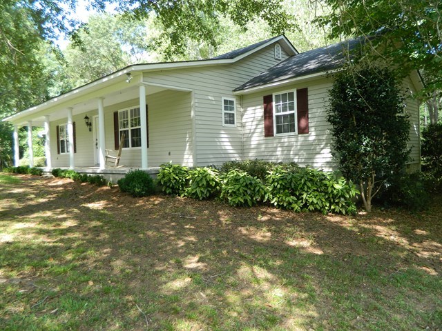 1625 Nowell Road West Macon, GA 31220 - Photo 2 of 21 a front view of a house with a yard