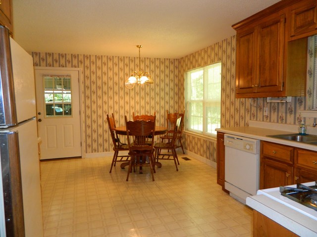1625 Nowell Road West Macon, GA 31220 - Photo 17 of 21 a view of a dining room with furniture and a window