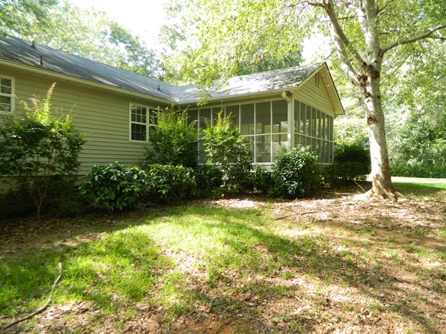 1625 Nowell Road West Macon, GA 31220 - Photo 4 of 21 a front view of a house with garden