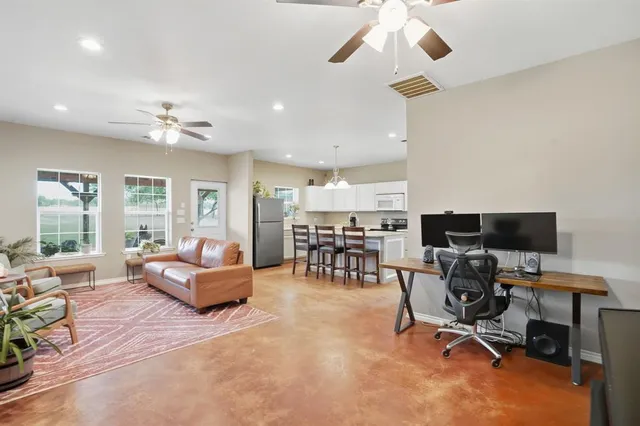 a bathroom with a shower and toilet