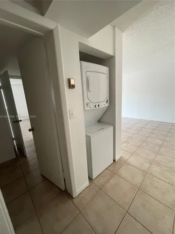 a utility room with cabinets