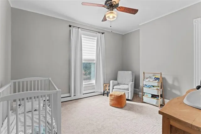 a bathroom with a shower sink and mirror