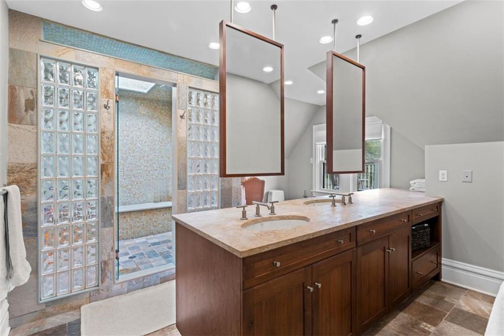 719 College Street Pittsburgh, PA 15232 - Photo 31 of 50 a bathroom with a sink double vanity and a mirror