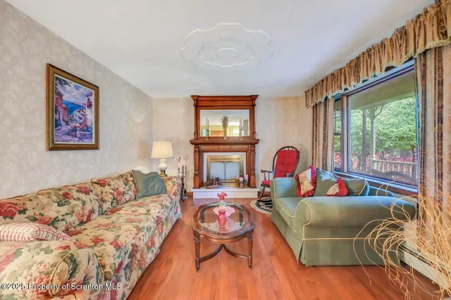a view of a dining room with furniture window and outside view