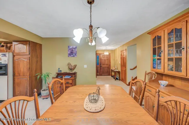 a kitchen with stainless steel appliances a stove sink microwave and cabinets