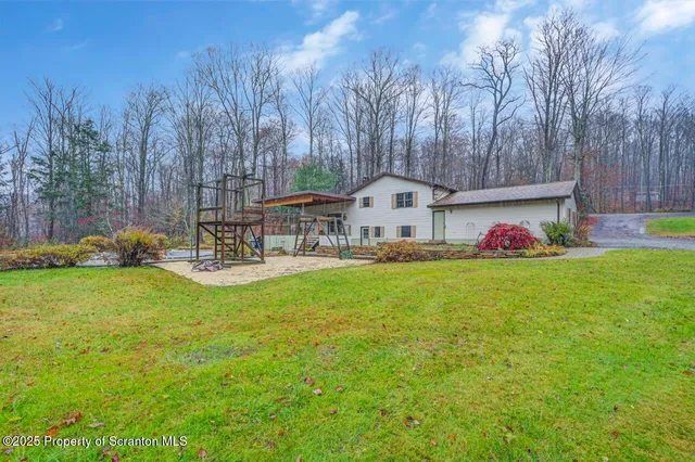 a view of garden with outdoor seating