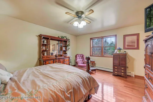 a bathroom with a sink a mirror and a window