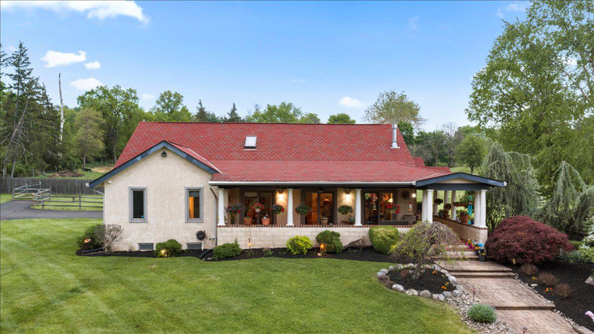 1121 Swamp Road Furlong, PA 18925 - Photo 3 of 50 Come sit and enjoy the porch surrounded by nature