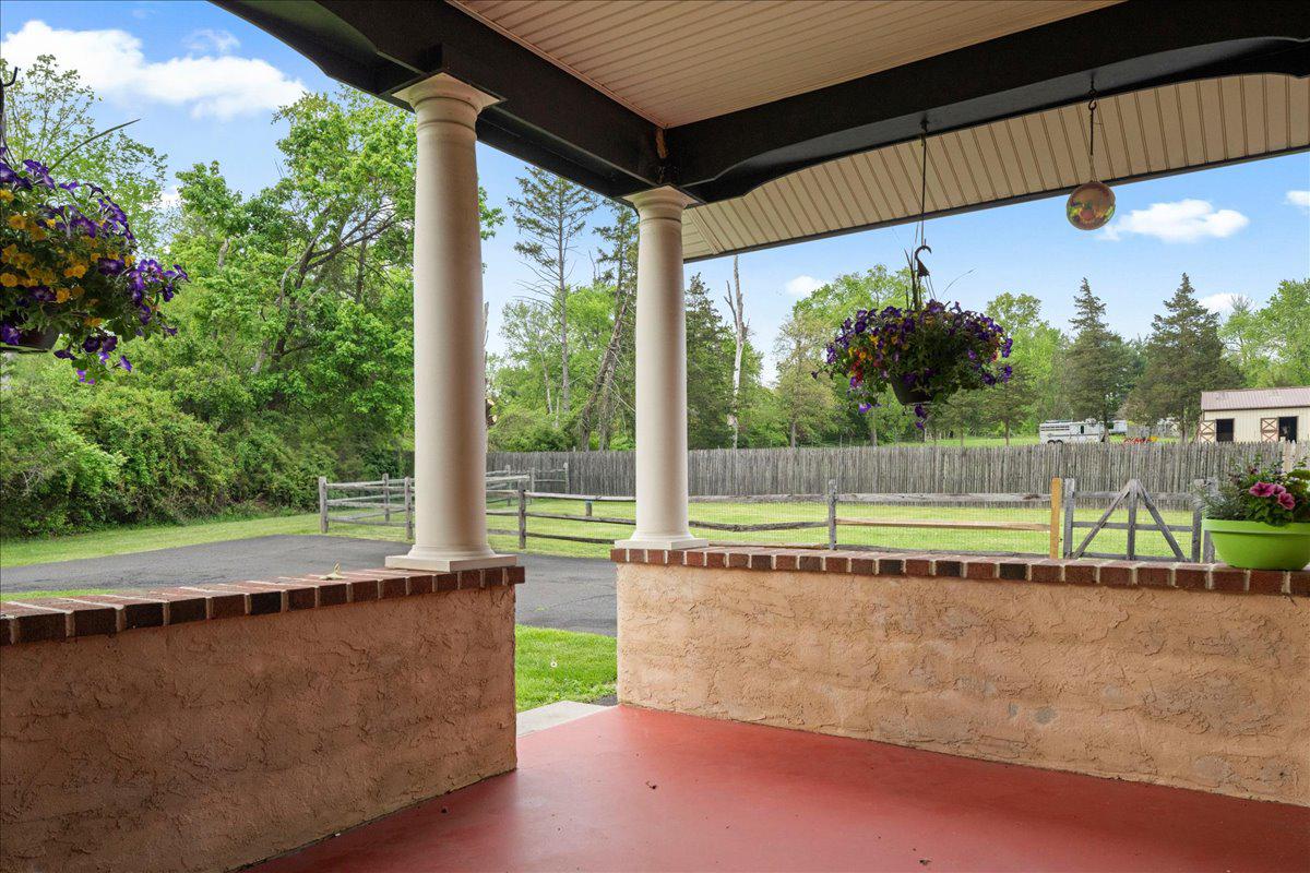 1121 Swamp Road Furlong, PA 18925 - Photo 35 of 50 Private rear porch with views of horse farm