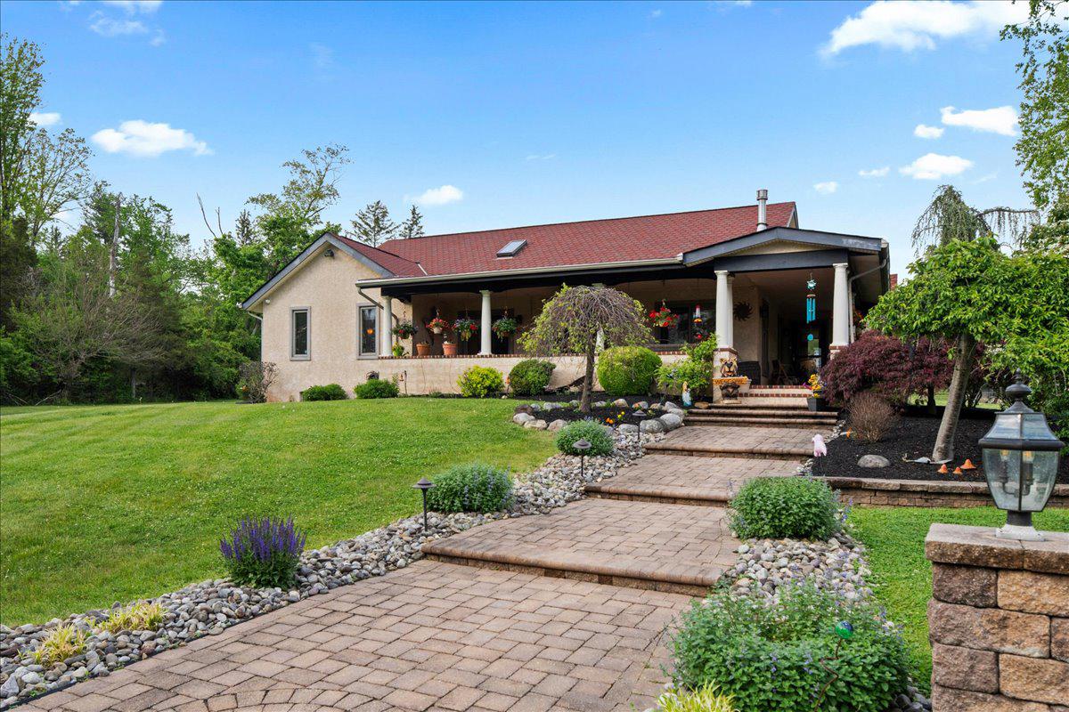 1121 Swamp Road Furlong, PA 18925 - Photo 6 of 50 Beautiful landscaping at every turn