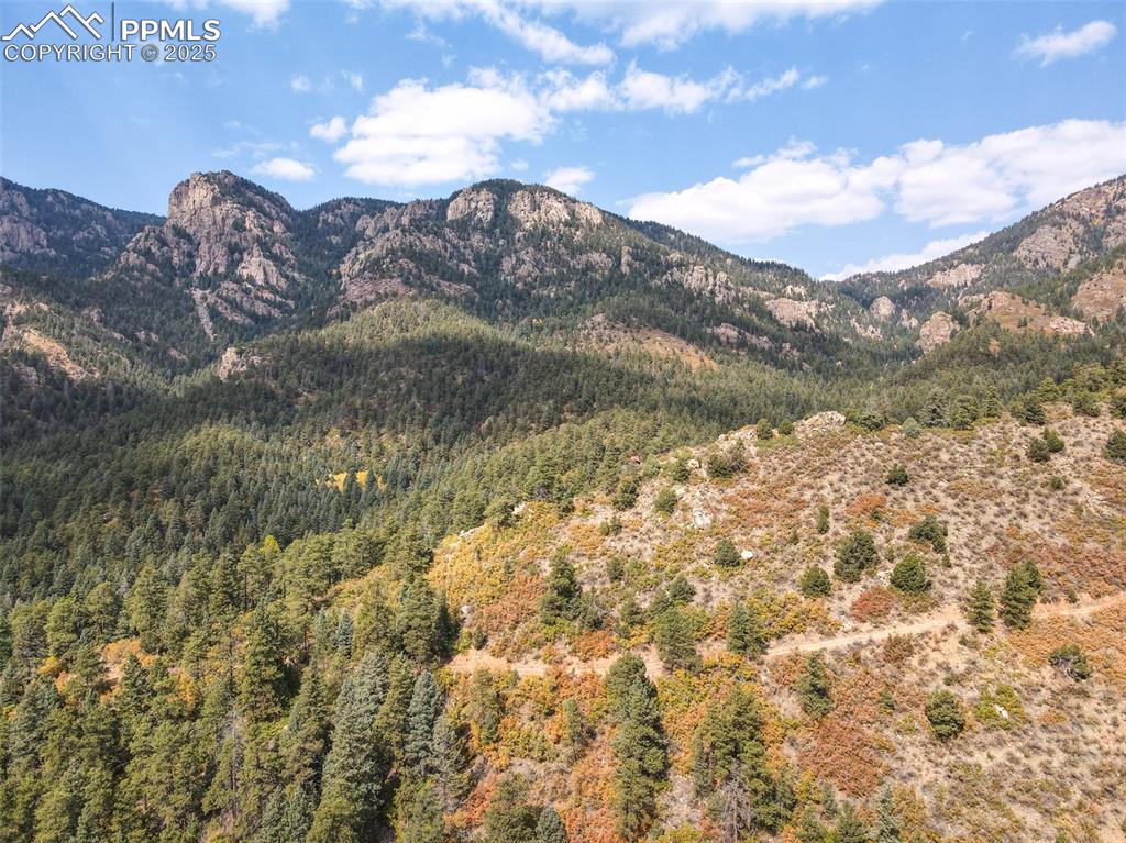 4950 Little Turkey Creek Road Colorado Springs, CO 80926 - Photo 28 of 33 a view of lake with mountain
