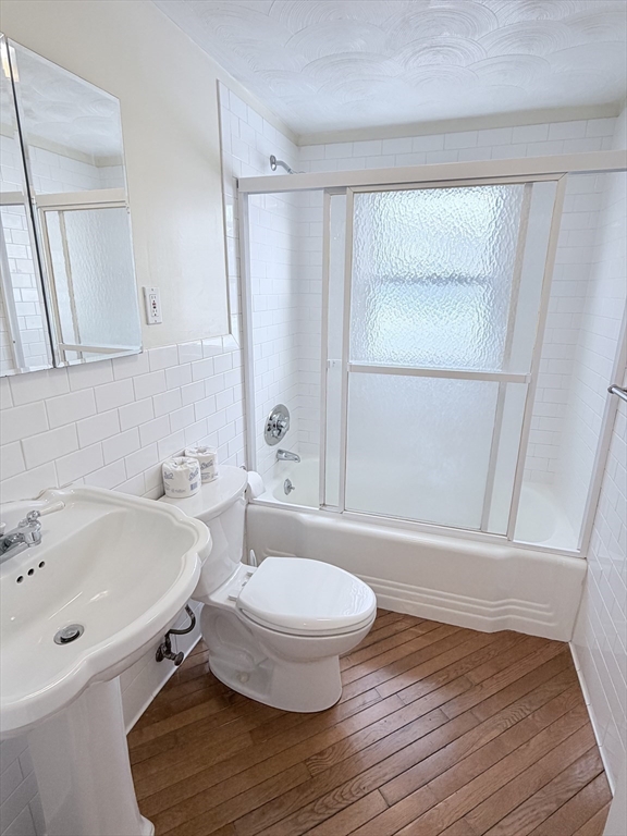 188 Lexington Street Newton, MA 02466 - Photo 8 of 12 a bathroom with a sink and a mirror