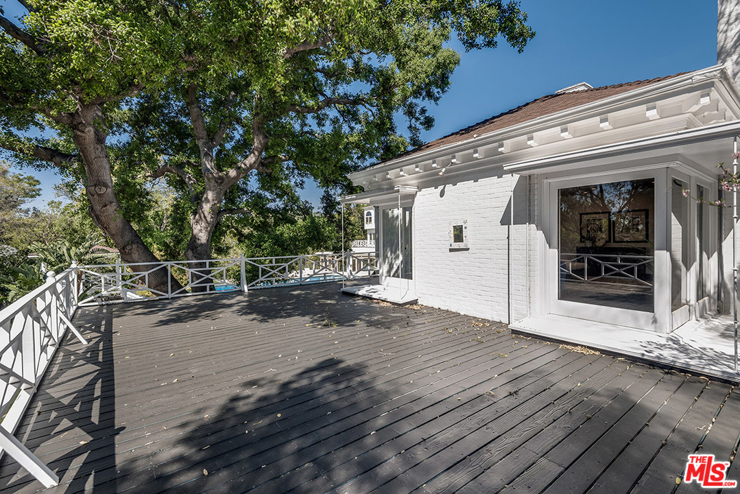 243 Delfern Drive Los Angeles, CA 90077 - Photo 21 of 32 a view of a house with a outdoor space