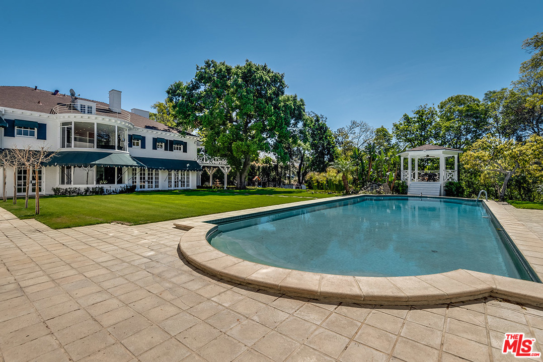 243 Delfern Drive Los Angeles, CA 90077 - Photo 27 of 32 a view of outdoor space yard deck and lake view