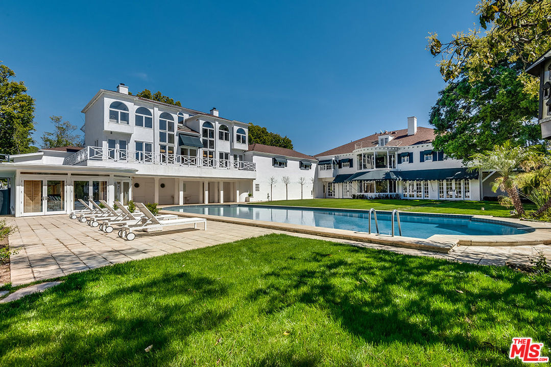 243 Delfern Drive Los Angeles, CA 90077 - Photo 28 of 32 a view of a house with swimming pool and sitting area