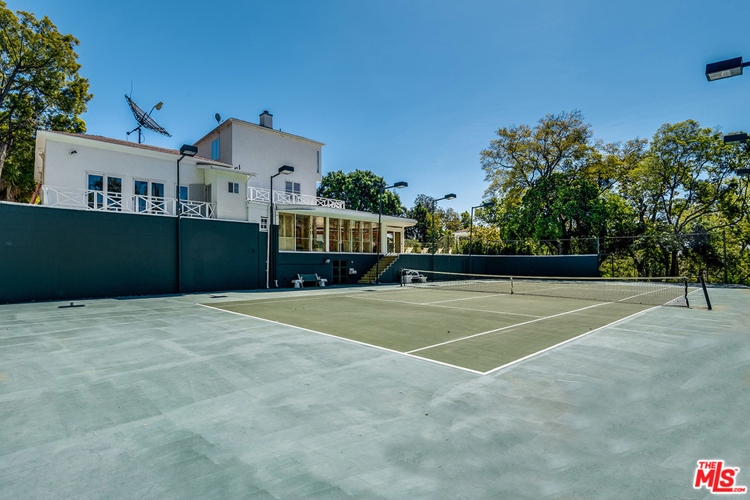 243 Delfern Drive Los Angeles, CA 90077 - Photo 30 of 32 a view of a tennis court