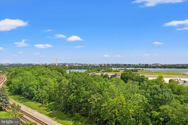 a lobby with furniture and potted plant
