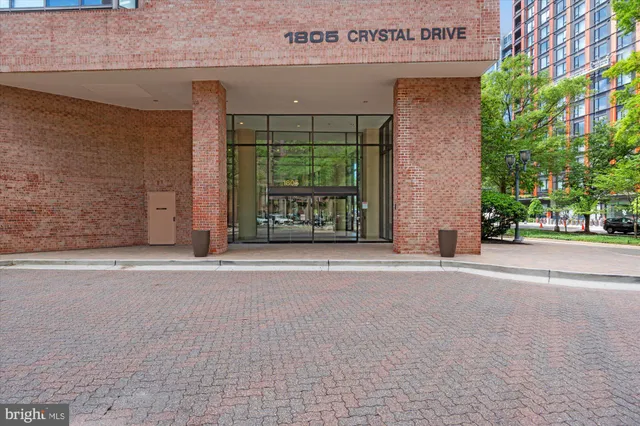 a view of livingroom with furniture and floor to ceiling window
