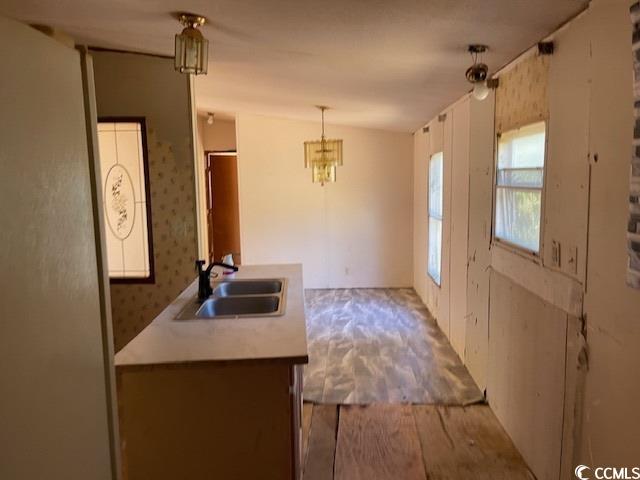 344 Sonny Road Gresham, SC 29546 - Photo 5 of 14 Kitchen featuring a notable chandelier, sink, and