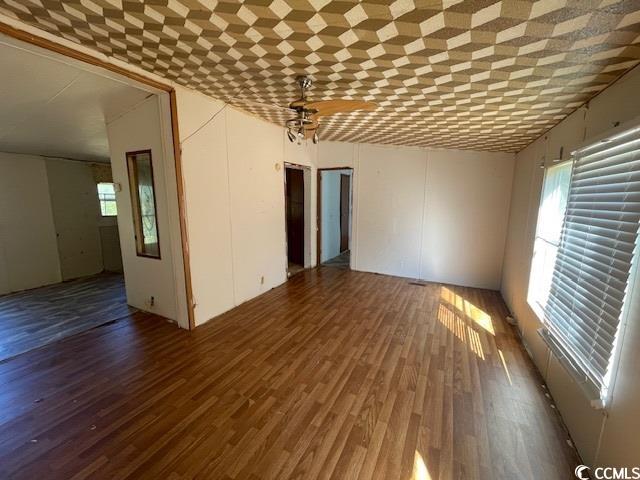 344 Sonny Road Gresham, SC 29546 - Photo 7 of 14 Empty room with dark hardwood / wood-style floors