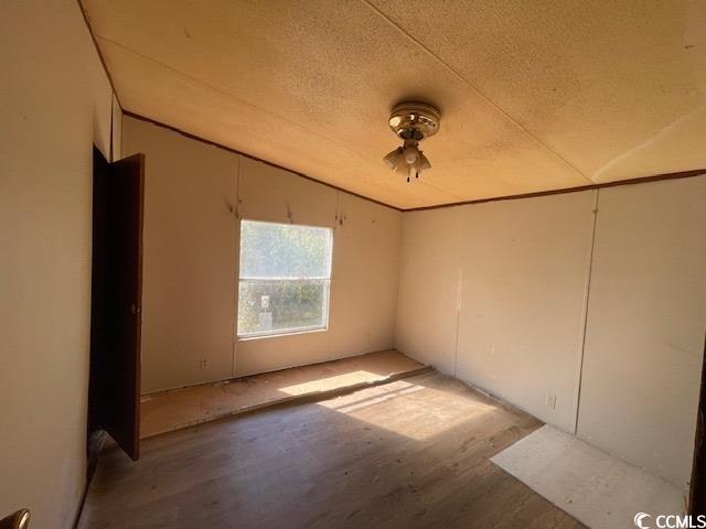 344 Sonny Road Gresham, SC 29546 - Photo 8 of 14 Spare room featuring a textured ceiling, ceiling f
