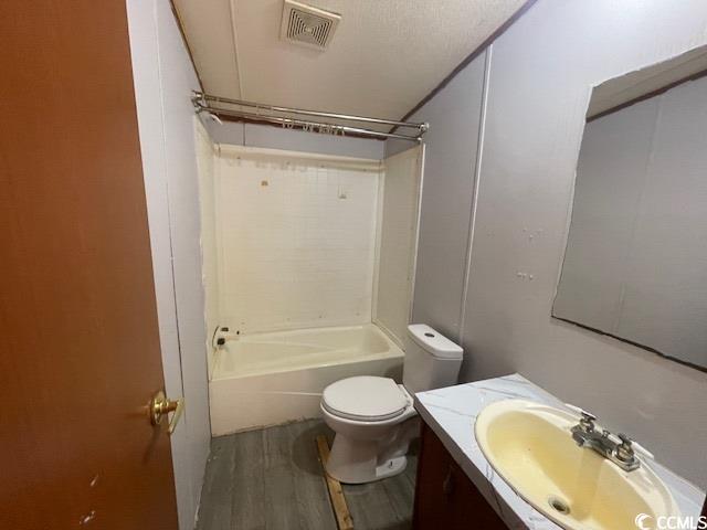 344 Sonny Road Gresham, SC 29546 - Photo 10 of 14 Full bathroom with vanity, wood-type flooring, toi