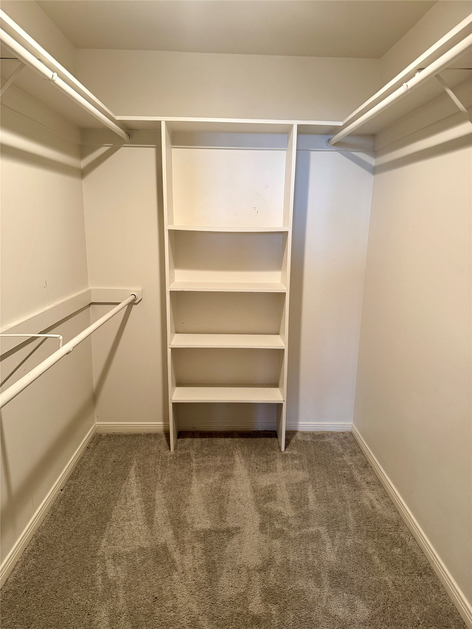 3525 Sage Road, Unit 813 Houston, TX 77056 - Photo 5 of 11 a view of walk in closet with empty racks