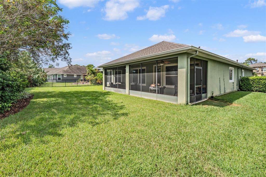 6908 Covington Stone Avenue Apollo Beach, FL 33572 - Photo 33 of 60 a view of a house with yard and porch