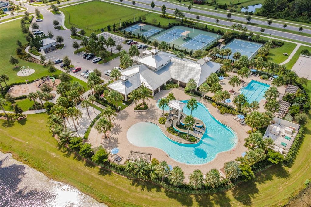 6908 Covington Stone Avenue Apollo Beach, FL 33572 - Photo 37 of 60 an aerial view of a house with a swimming pool