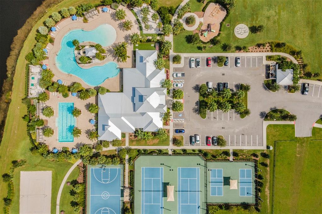 6908 Covington Stone Avenue Apollo Beach, FL 33572 - Photo 40 of 60 an aerial view of a house with a swimming pool