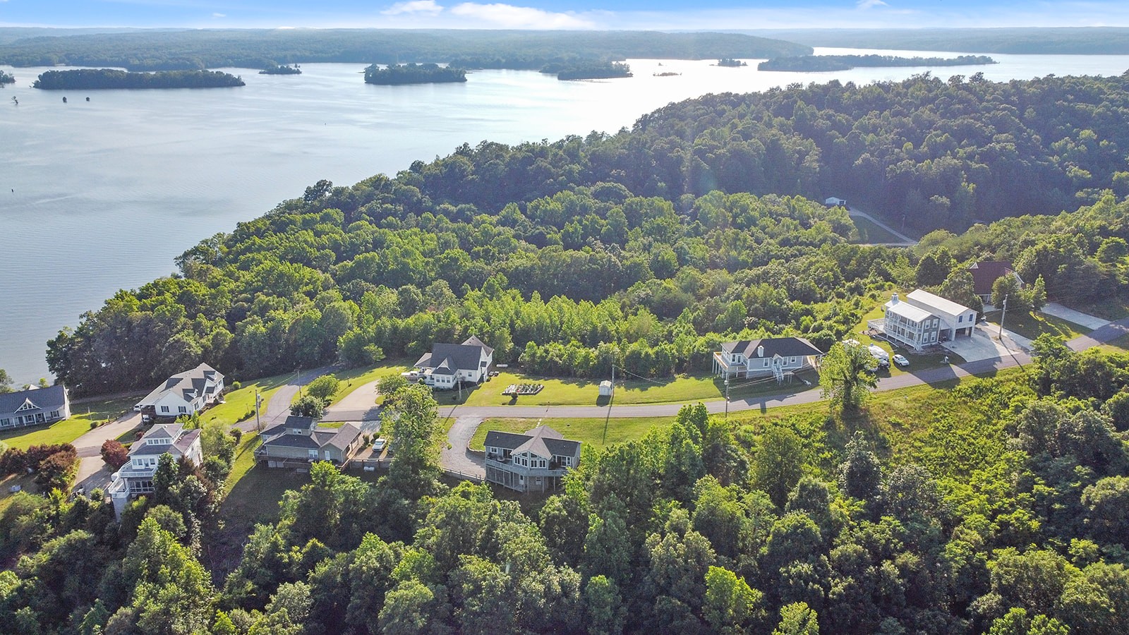 465 Turtle Point Lane Waverly, TN 37185 - Photo 13 of 49 a view of a lake in middle of the town