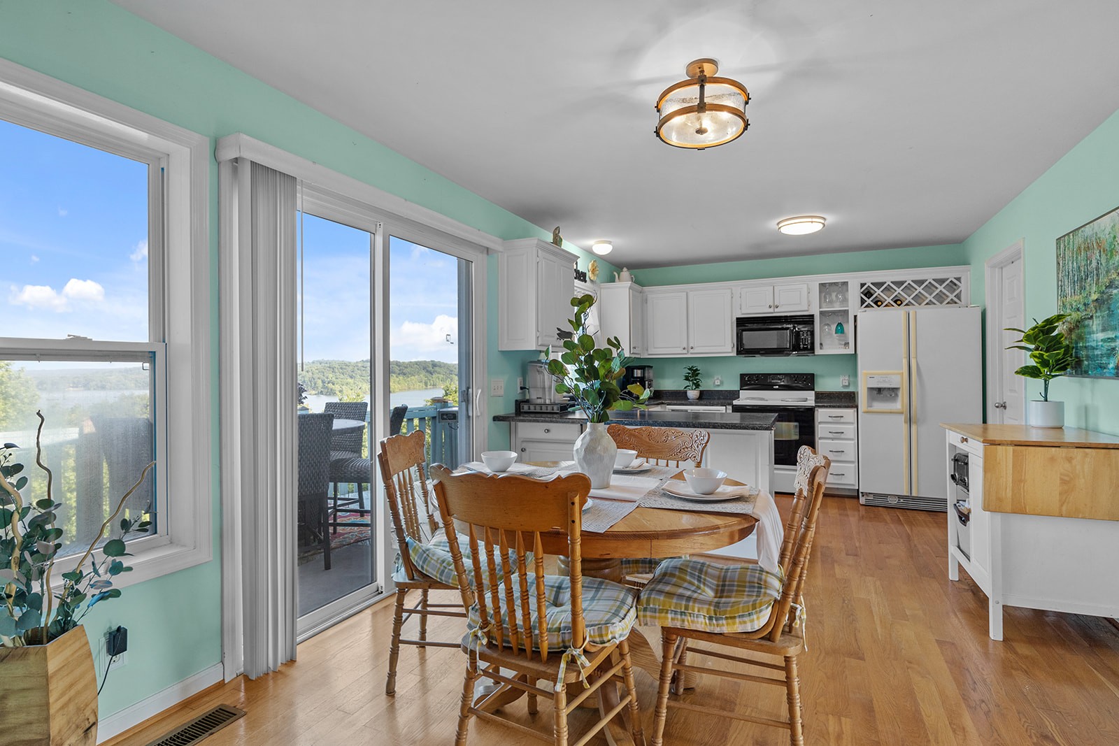 465 Turtle Point Lane Waverly, TN 37185 - Photo 24 of 49 a view of a dining room with furniture window and wooden floor