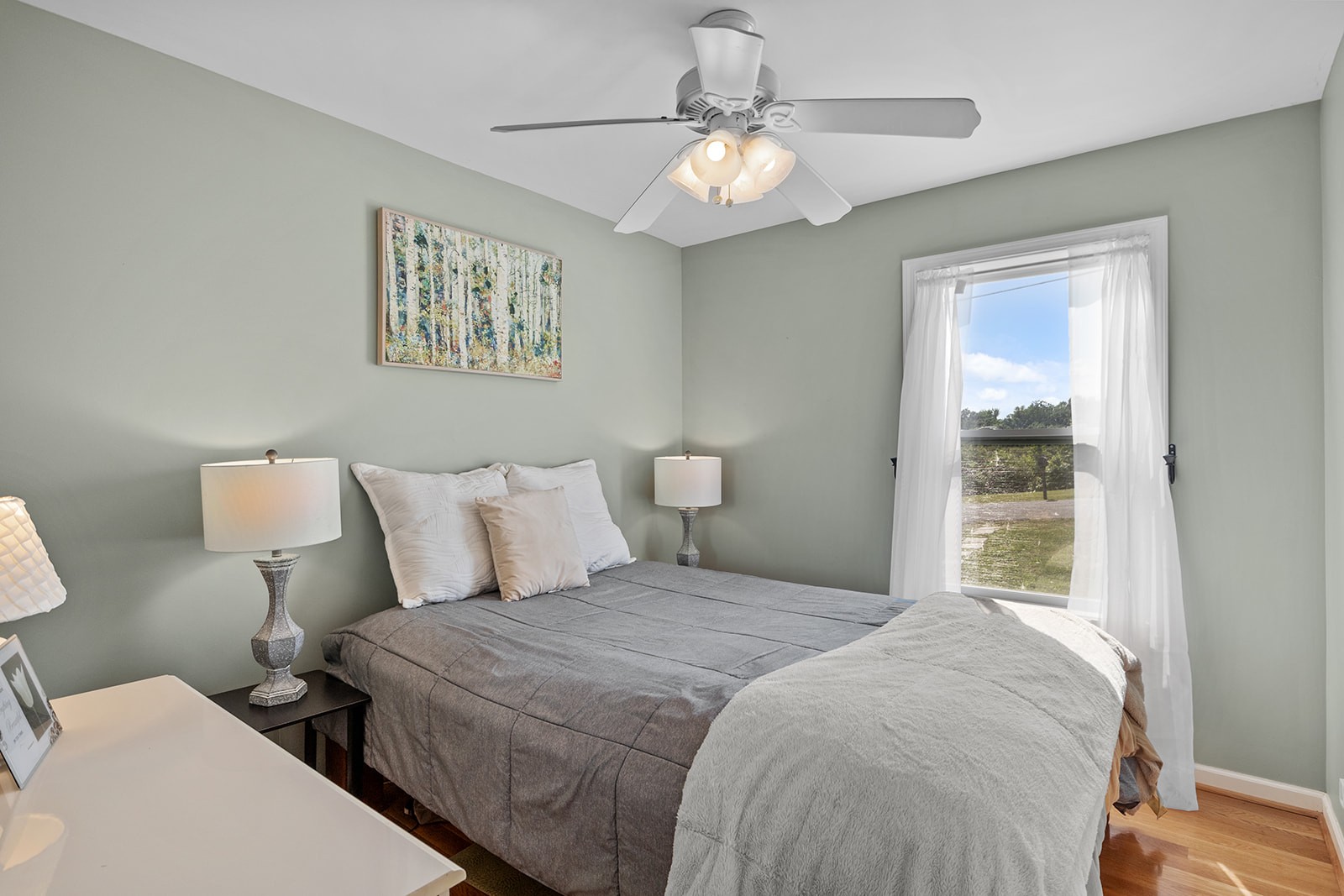 465 Turtle Point Lane Waverly, TN 37185 - Photo 30 of 49 a bedroom with a large bed and a window