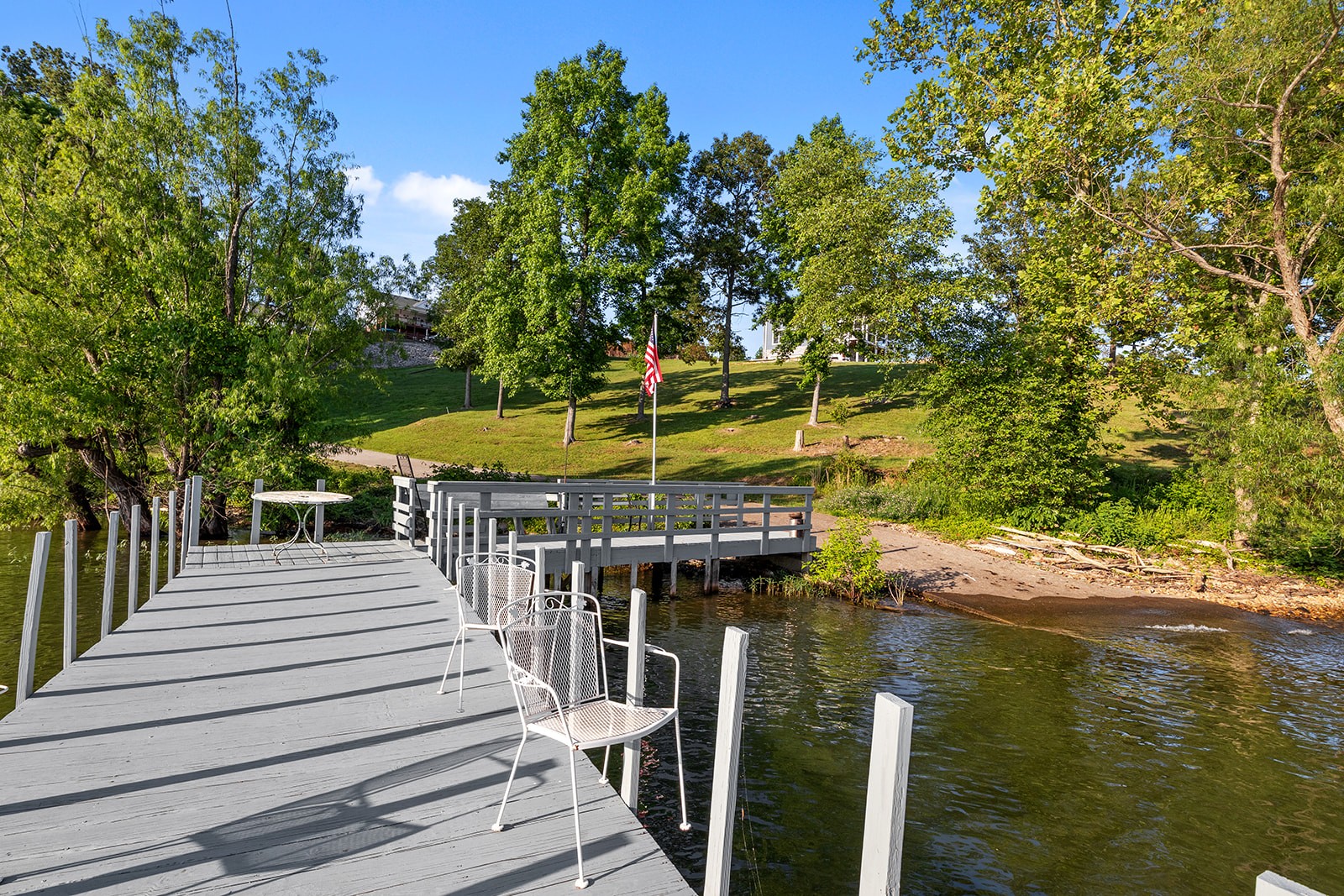 465 Turtle Point Lane Waverly, TN 37185 - Photo 3 of 49 a view of a balcony with two chairs and a table