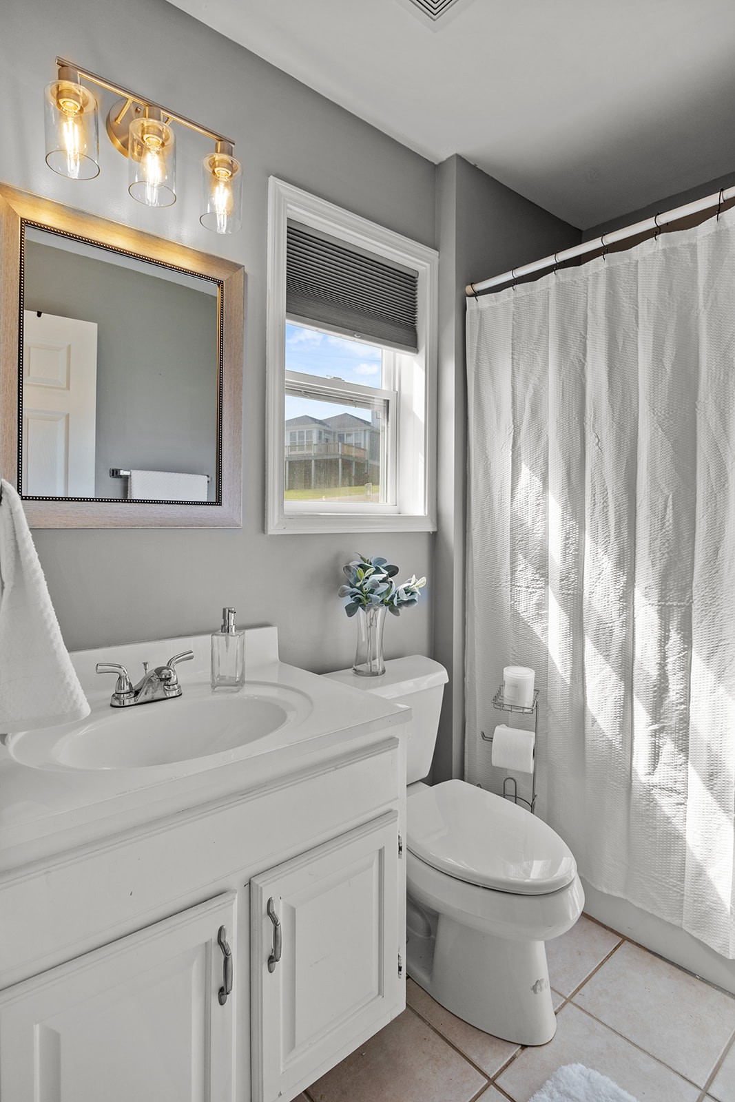 465 Turtle Point Lane Waverly, TN 37185 - Photo 35 of 49 a bathroom with a granite countertop sink mirror vanity and toilet